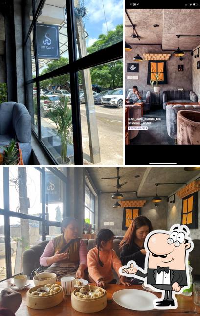 Take a seat at one of the tables at OM CAFE
