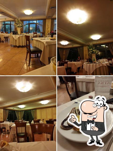 Dai un'occhiata agli interni di Trattoria Al Faro S.R.L
