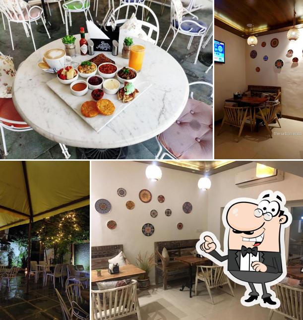 Take a seat at one of the tables at Coffeeville Udaipur