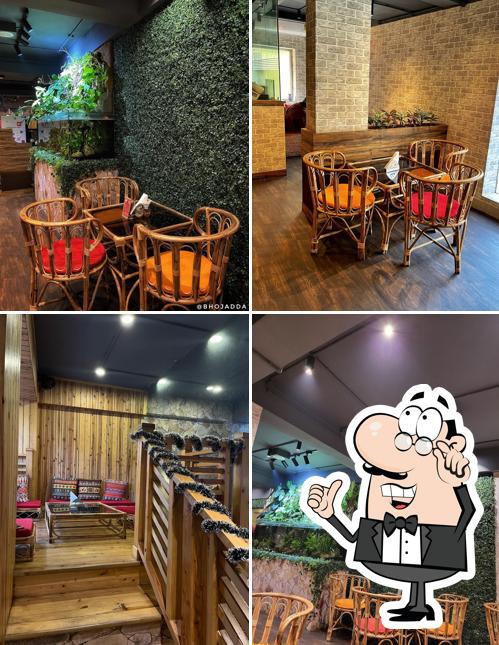 Take a seat at one of the tables at Cafe Yonder