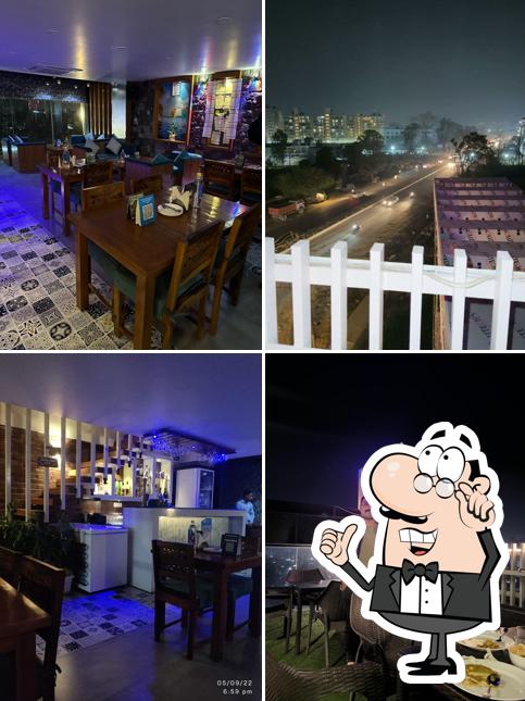 Take a seat at one of the tables at Blue and Beyond Family Restaurant & Bar
