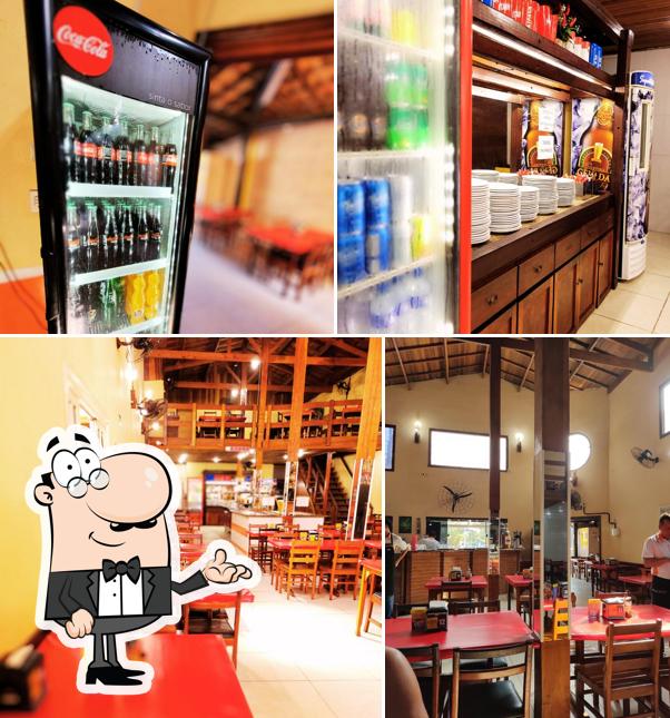 Sente em uma das mesas no Restaurante Leblon Itanhaém