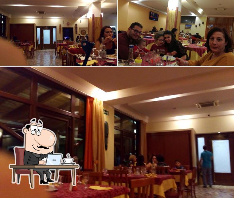 Siediti a un tavolo di Panoramik Ristorante Pizzeria B&B