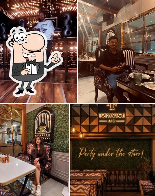 Take a seat at one of the tables at TopNotch