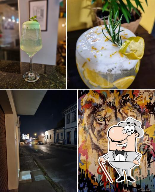 A ilustração da exterior e comida no Adega Gastrobar