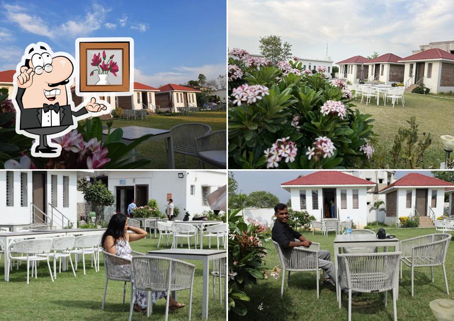 Take a seat at one of the tables at PERGOLA RESTAURANT