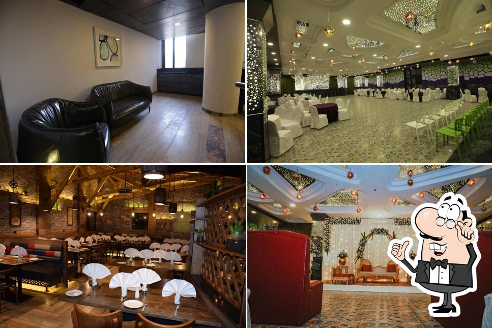 Take a seat at one of the tables at Hummingbird Hotel & Banquet