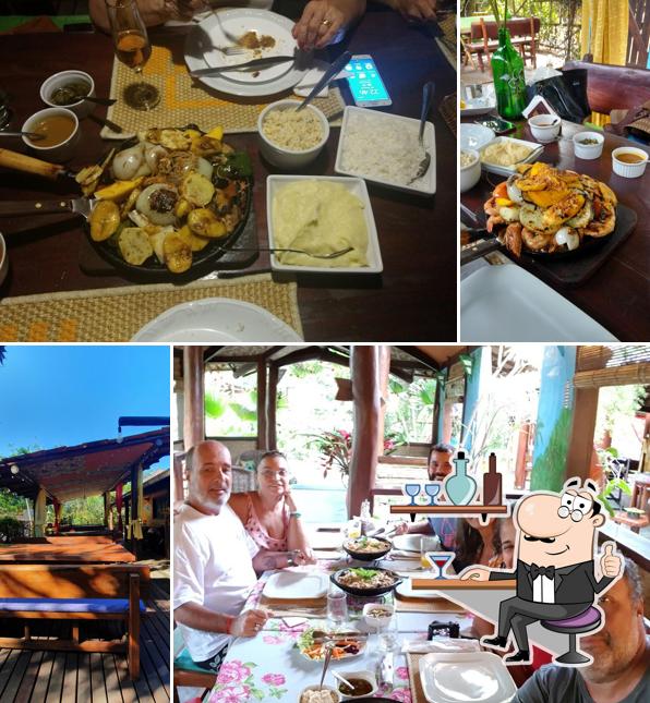 Sente em uma das mesas no Restaurante A Tapera