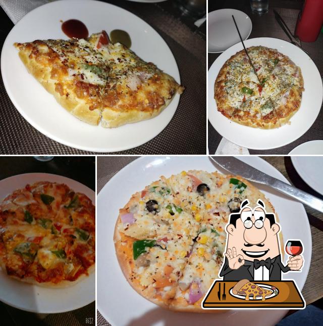 Get pizza at Shree RadhaKrishna