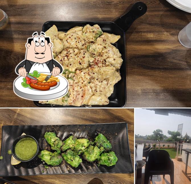 Check out the photo showing food and interior at Mezbaan Restaurant Walwati shriwardhan