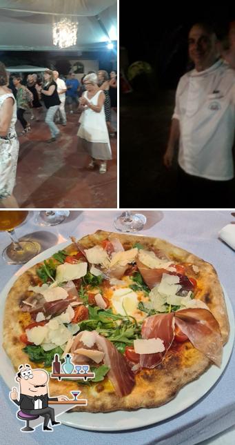 Siediti a un tavolo di Posada Park Hotel Corallo ristorante da Angelo