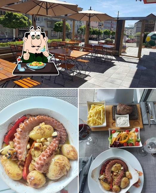 La immagine della cibo e esterno di Café Restaurant Rick's