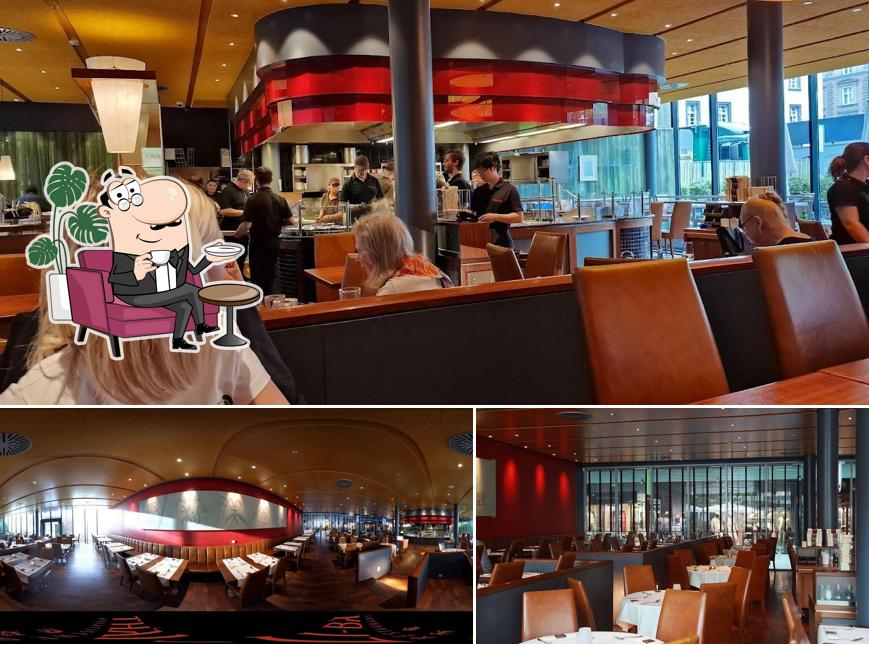 Installez-vous à l'une des tables de Thai-Li-Ba