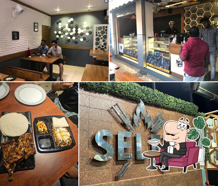Take a seat at one of the tables at SELEX TEA & GRILL HUB