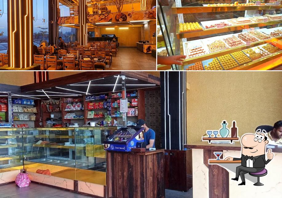 Take a seat at one of the tables at Narayani Sweet Next