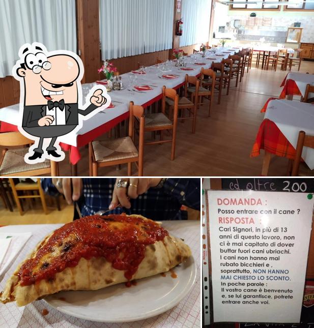 Siediti a un tavolo di Pizzeria Iris