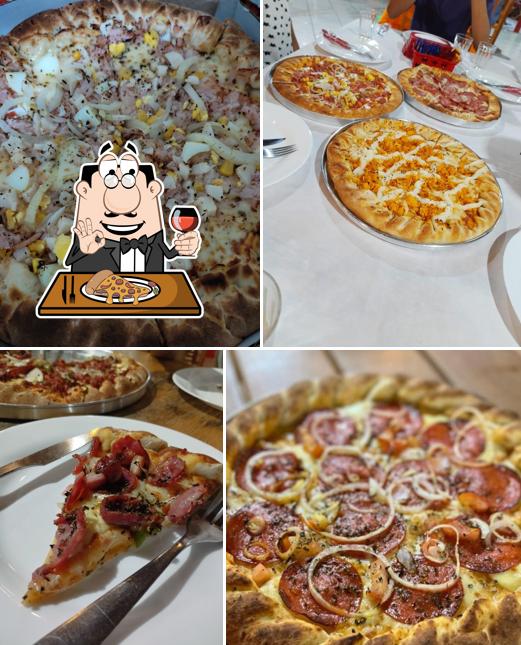 Escolha pizza no Pizzaria Texas Grill - Miguel Sutil