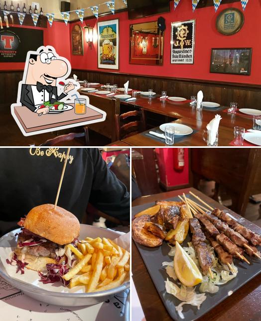 La immagine della cibo e interni di Sand Glass Pub