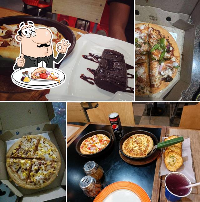 Try out pizza at Pizza Hut Omaxe CP, Noida