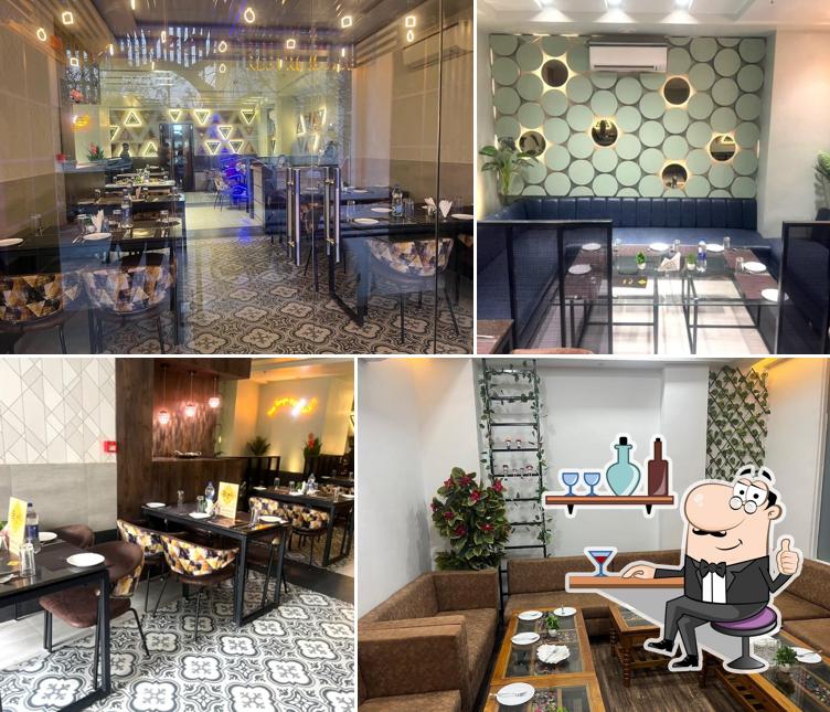 Take a seat at one of the tables at Tea Spoon Restro and Cafe is a beautiful admospier