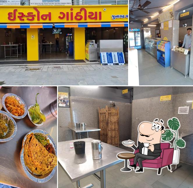 Take a seat at one of the tables at Iscon Gathiya - Vadodara