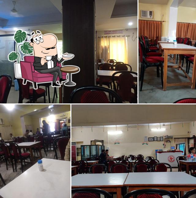 Take a seat at one of the tables at Indian coffee house Rewa