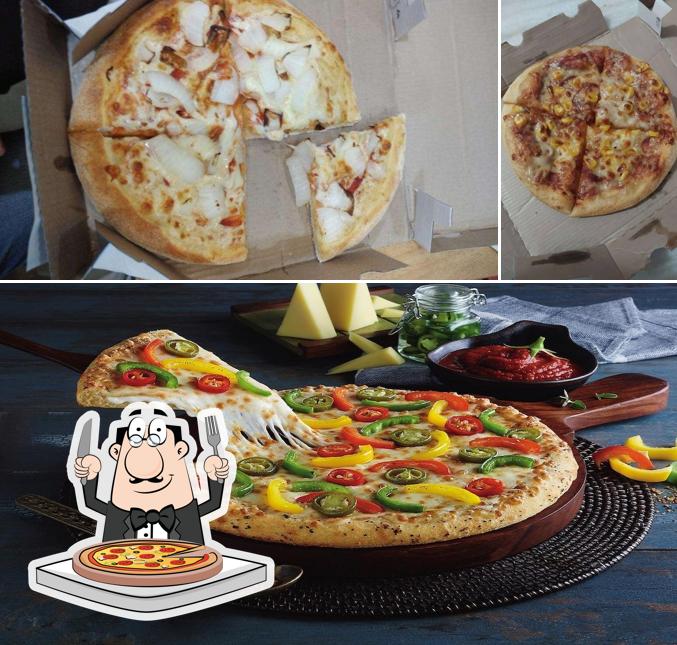 Try out pizza at Domino's Pizza