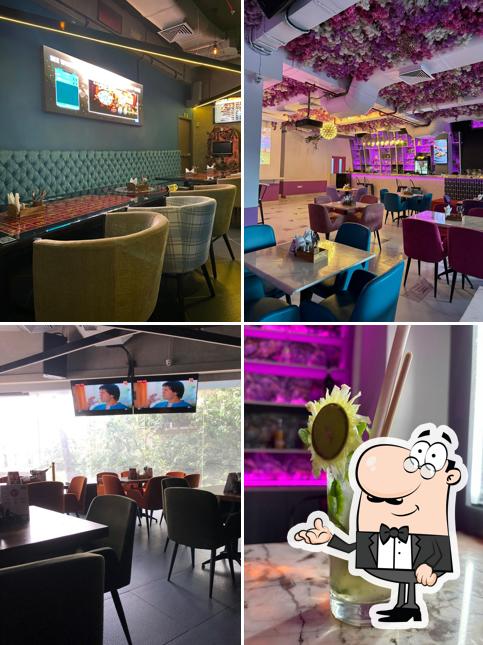 Take a seat at one of the tables at PURPLE PENGUIN