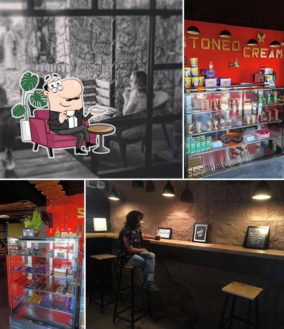 Take a seat at one of the tables at STONED CREAM Franchise