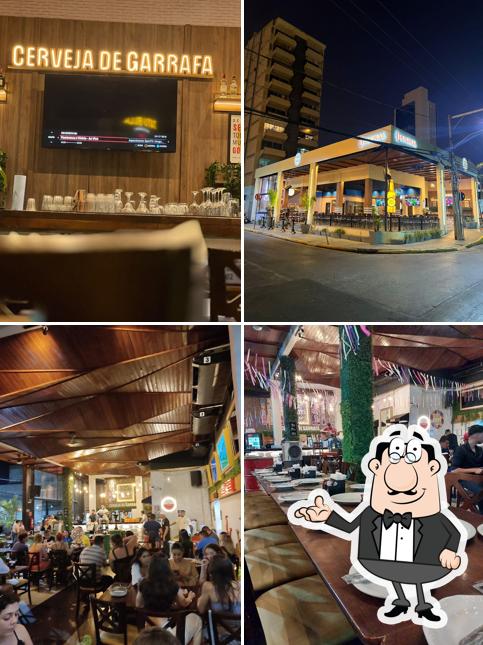 Sente em uma das mesas no Bar Cerveja de Garrafa