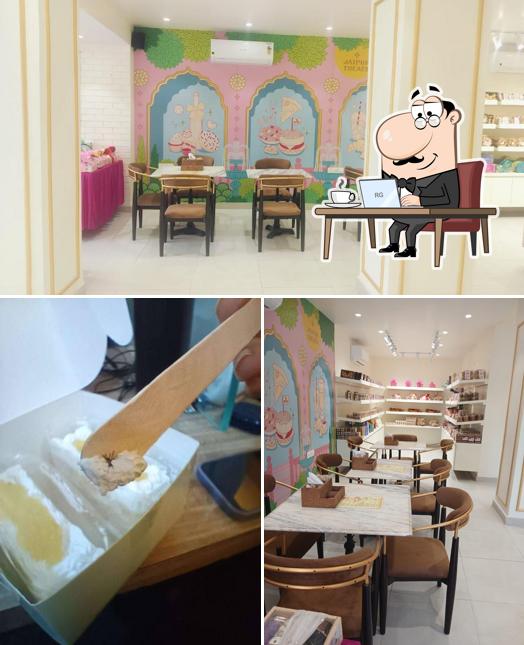 Take a seat at one of the tables at The Crust Eggless Bakery - C Scheme, Jaipur
