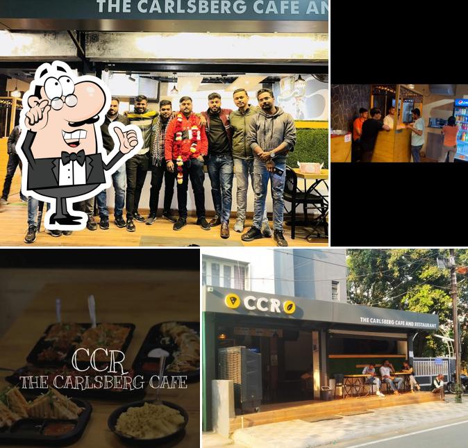Take a seat at one of the tables at CCR - The Carlsberg Cafe And Resturant