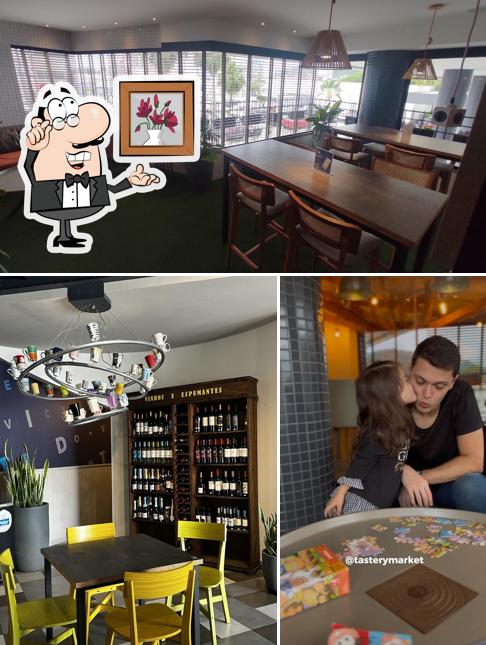 Sente em uma das mesas no Dom Vicente Gastrobar