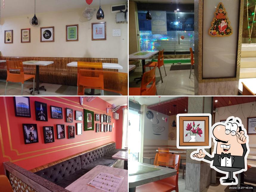 Take a seat at one of the tables at The Local Café Dhanbad