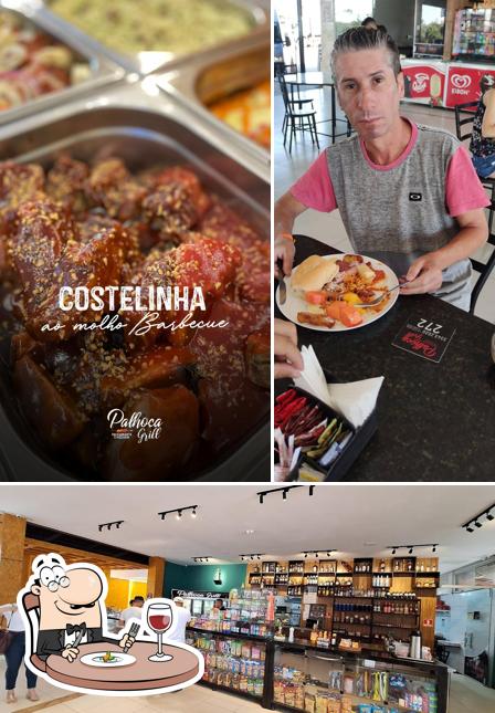 Dê uma olhada a ilustração apresentando comida e interior no Palhoça Grill