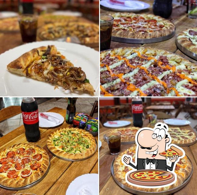 Escolha pizza no Pizzaria Texas Grill - Miguel Sutil