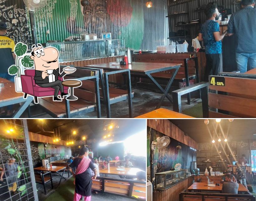 Take a seat at one of the tables at Daddy Cafe