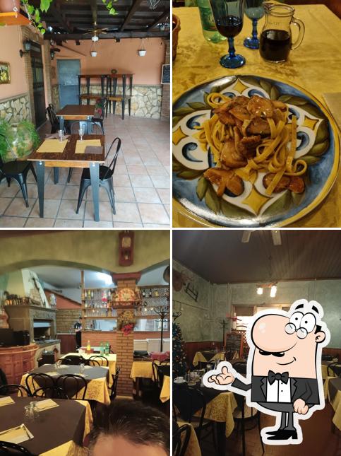 Siediti a un tavolo di I Due Archi Trattoria Pizzeria