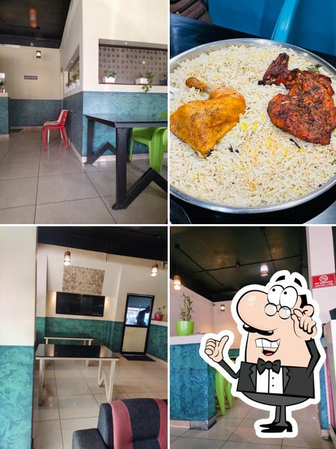 Take a seat at one of the tables at Al Ajmi Yemen Kuzhimandi