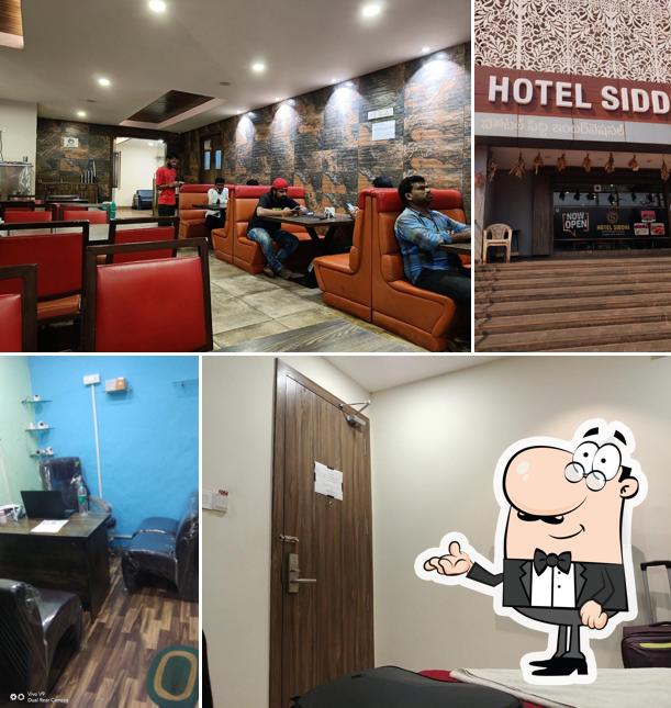 Take a seat at one of the tables at Hotel Siddhi International