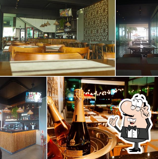 Sente em uma das mesas no Zilá Restaurante & Eventos