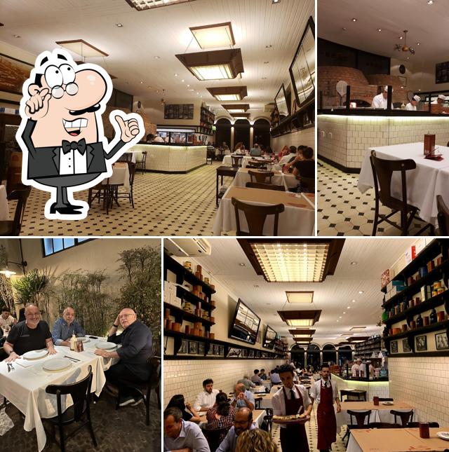 Sente em uma das mesas no Bráz Pizzaria - Moema