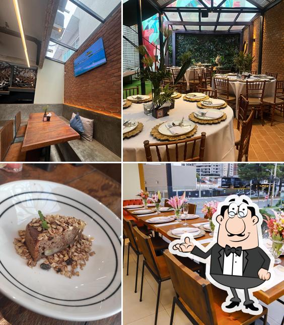 Sente em uma das mesas no Restaurante Manero restaurante