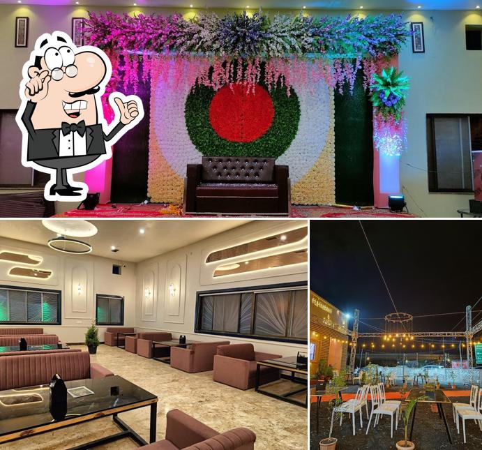 Take a seat at one of the tables at Virasat Restaurant & Lawn