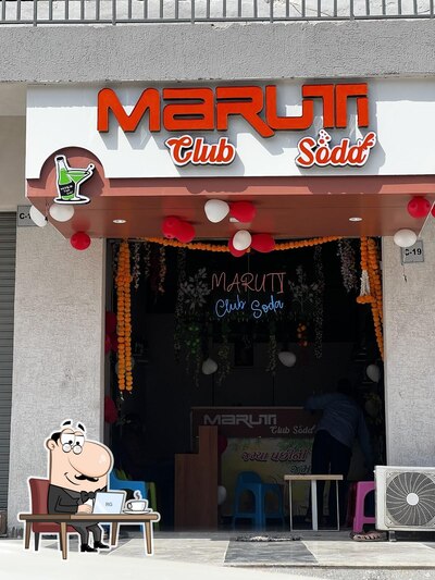 Take a seat at one of the tables at Maruti Club Soda
