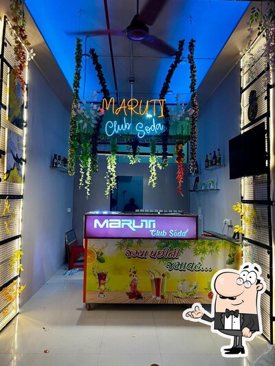 Take a seat at one of the tables at Maruti Club Soda