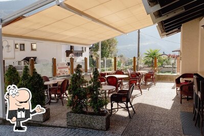 Siediti a un tavolo di Pensione Lahn