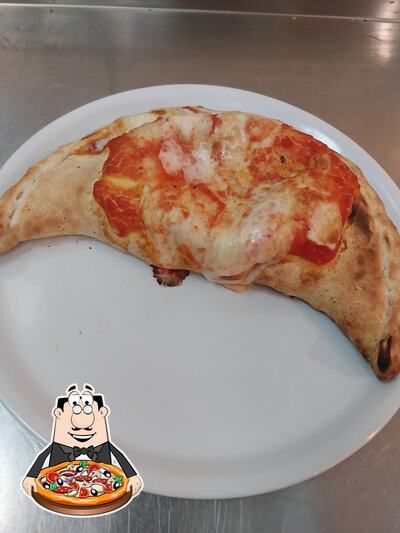 A Pizzeria Roma, puoi assaggiare una bella pizza